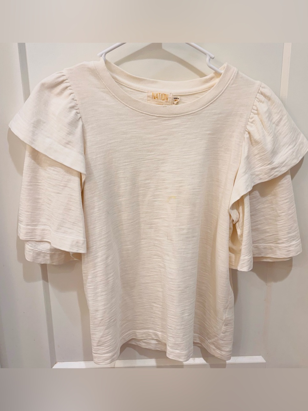 NATION Ivory Ruffle Sleeve Tee. Size 
X-Small in mint condition